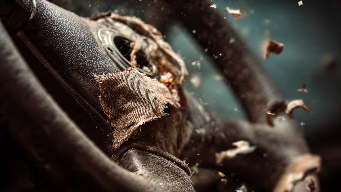 A deployed airbag with forensic examination marks revealing counterfeit inflator components linked to NHTSA investigation EA25005