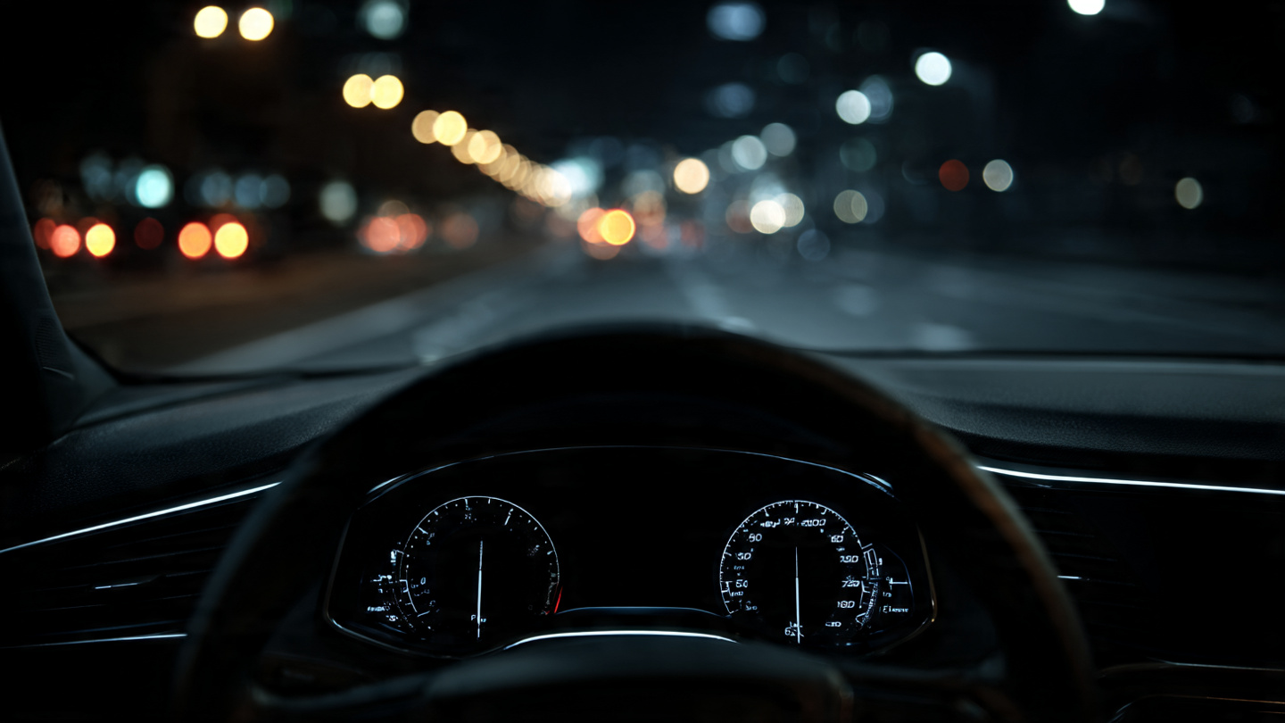 A modern vehicle dashboard with a completely blank digital instrument cluster