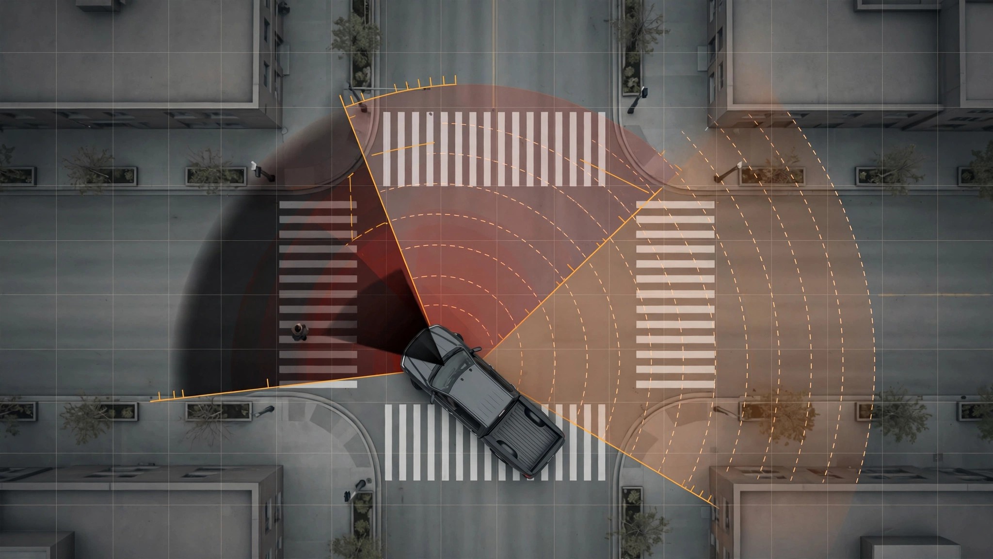 Top-down view of a pickup truck blind zone at an intersection crosswalk