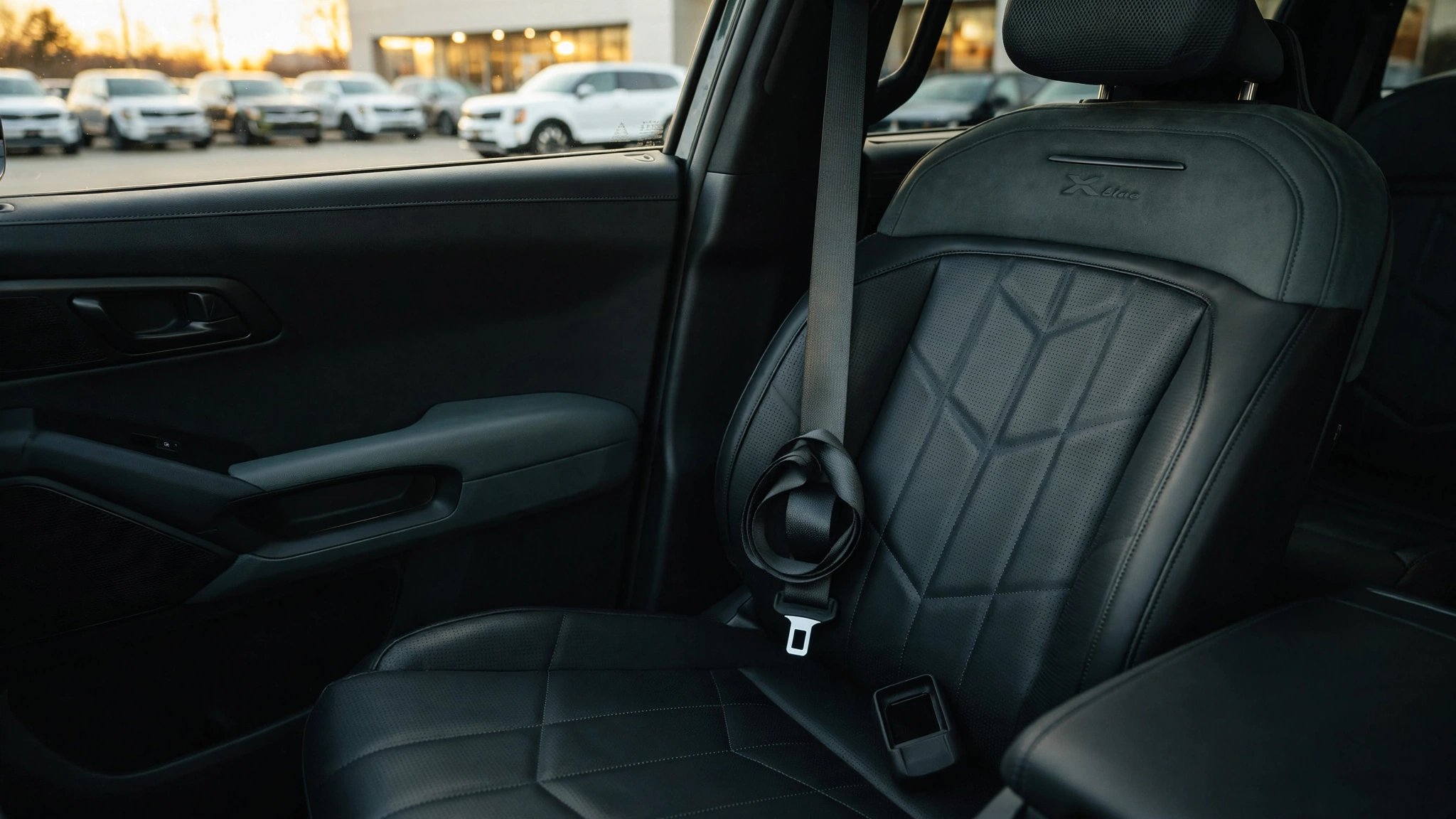 A 2027 Kia Telluride SUV with an unbuckled seatbelt